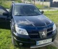 Чорний Міцубісі Аутлендер, об'ємом двигуна 2 л та пробігом 178 тис. км за 6850 $, фото 19 на Automoto.ua