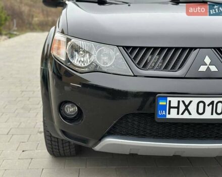 Черный Мицубиси Аутлендер, объемом двигателя 3 л и пробегом 248 тыс. км за 9800 $, фото 6 на Automoto.ua