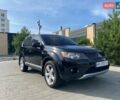 Черный Мицубиси Аутлендер, объемом двигателя 3 л и пробегом 247 тыс. км за 9900 $, фото 1 на Automoto.ua