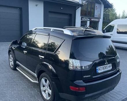Черный Мицубиси Аутлендер, объемом двигателя 2.4 л и пробегом 290 тыс. км за 9500 $, фото 11 на Automoto.ua