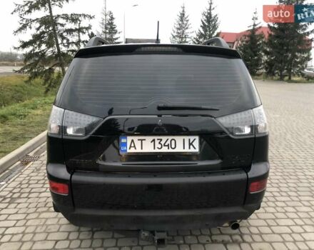 Чорний Міцубісі Аутлендер, об'ємом двигуна 2.4 л та пробігом 199 тис. км за 8999 $, фото 3 на Automoto.ua