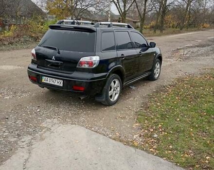 Черный Мицубиси Аутлендер, объемом двигателя 2 л и пробегом 209 тыс. км за 5700 $, фото 5 на Automoto.ua