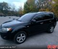 Черный Мицубиси Аутлендер, объемом двигателя 2.4 л и пробегом 210 тыс. км за 7800 $, фото 1 на Automoto.ua