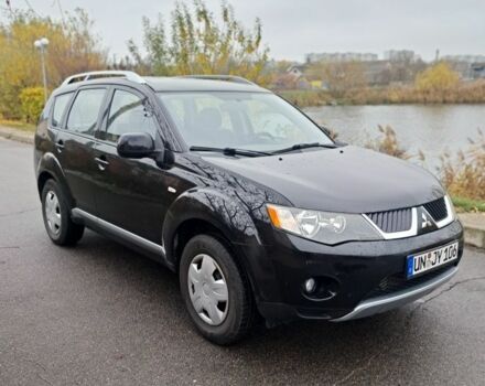 Черный Мицубиси Аутлендер, объемом двигателя 2 л и пробегом 226 тыс. км за 4700 $, фото 1 на Automoto.ua