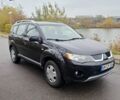 Черный Мицубиси Аутлендер, объемом двигателя 2 л и пробегом 226 тыс. км за 4700 $, фото 1 на Automoto.ua