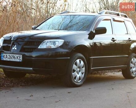 Черный Мицубиси Аутлендер, объемом двигателя 2 л и пробегом 189 тыс. км за 7200 $, фото 10 на Automoto.ua