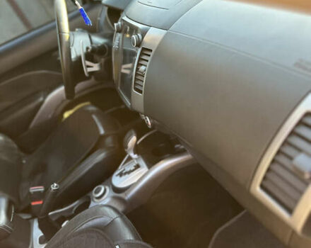 Черный Мицубиси Аутлендер, объемом двигателя 2.36 л и пробегом 253 тыс. км за 9600 $, фото 15 на Automoto.ua