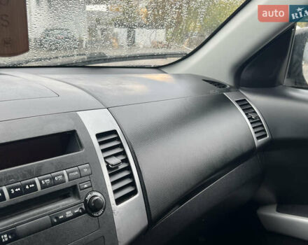 Черный Мицубиси Аутлендер, объемом двигателя 2.4 л и пробегом 230 тыс. км за 6650 $, фото 39 на Automoto.ua