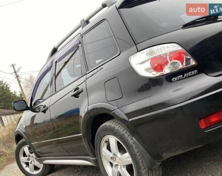 Черный Мицубиси Аутлендер, объемом двигателя 2.4 л и пробегом 178 тыс. км за 6900 $, фото 12 на Automoto.ua