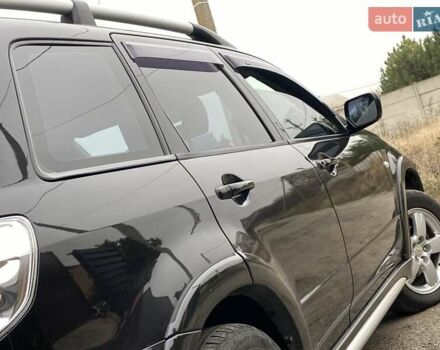 Черный Мицубиси Аутлендер, объемом двигателя 2.4 л и пробегом 178 тыс. км за 6900 $, фото 21 на Automoto.ua