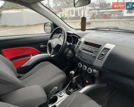 Черный Мицубиси Аутлендер, объемом двигателя 2.4 л и пробегом 230 тыс. км за 6650 $, фото 53 на Automoto.ua