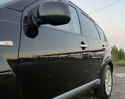 Черный Мицубиси Аутлендер, объемом двигателя 2.2 л и пробегом 310 тыс. км за 9700 $, фото 2 на Automoto.ua