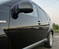 Черный Мицубиси Аутлендер, объемом двигателя 2.2 л и пробегом 310 тыс. км за 9700 $, фото 2 на Automoto.ua