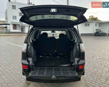 Черный Мицубиси Аутлендер, объемом двигателя 2.4 л и пробегом 230 тыс. км за 6650 $, фото 56 на Automoto.ua