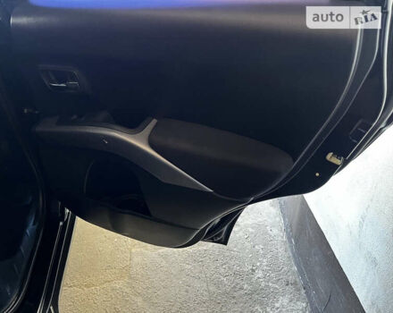 Чорний Міцубісі Аутлендер, об'ємом двигуна 2.4 л та пробігом 240 тис. км за 8800 $, фото 24 на Automoto.ua