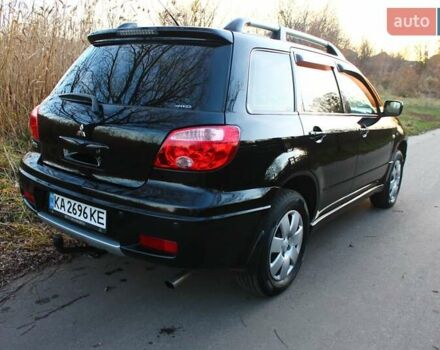 Черный Мицубиси Аутлендер, объемом двигателя 2 л и пробегом 189 тыс. км за 7200 $, фото 23 на Automoto.ua