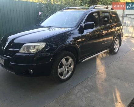 Чорний Міцубісі Аутлендер, об'ємом двигуна 2.38 л та пробігом 207 тис. км за 7000 $, фото 80 на Automoto.ua
