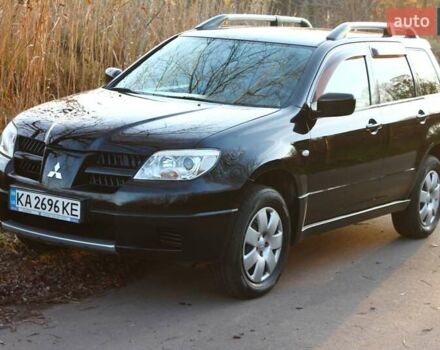 Черный Мицубиси Аутлендер, объемом двигателя 2 л и пробегом 189 тыс. км за 7200 $, фото 30 на Automoto.ua