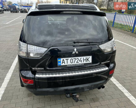 Черный Мицубиси Аутлендер, объемом двигателя 1.97 л и пробегом 244 тыс. км за 8800 $, фото 4 на Automoto.ua