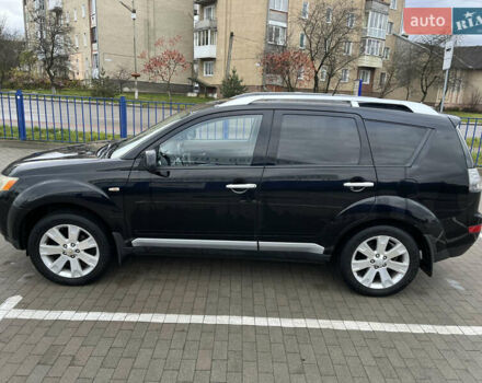 Черный Мицубиси Аутлендер, объемом двигателя 1.97 л и пробегом 244 тыс. км за 8700 $, фото 4 на Automoto.ua