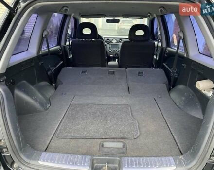 Черный Мицубиси Аутлендер, объемом двигателя 2 л и пробегом 306 тыс. км за 6500 $, фото 11 на Automoto.ua