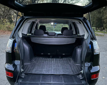 Чорний Міцубісі Аутлендер, об'ємом двигуна 1.97 л та пробігом 300 тис. км за 8600 $, фото 11 на Automoto.ua