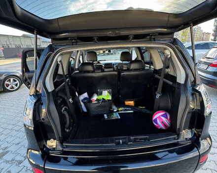 Черный Мицубиси Аутлендер, объемом двигателя 1.97 л и пробегом 202 тыс. км за 9700 $, фото 4 на Automoto.ua