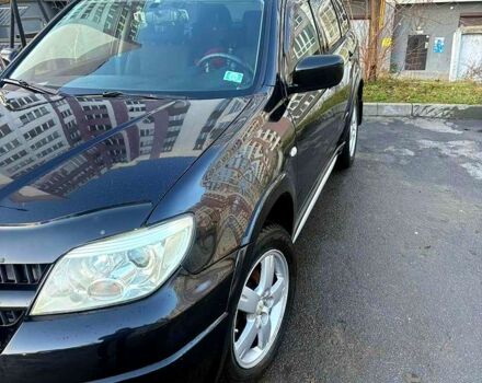 Черный Мицубиси Аутлендер, объемом двигателя 2.4 л и пробегом 231 тыс. км за 8500 $, фото 5 на Automoto.ua