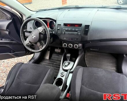 Черный Мицубиси Аутлендер, объемом двигателя 2.4 л и пробегом 200 тыс. км за 9999 $, фото 8 на Automoto.ua