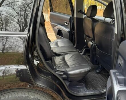 Чорний Міцубісі Аутлендер, об'ємом двигуна 3 л та пробігом 212 тис. км за 10000 $, фото 7 на Automoto.ua