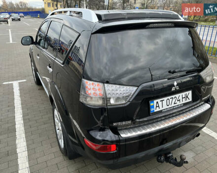 Черный Мицубиси Аутлендер, объемом двигателя 1.97 л и пробегом 244 тыс. км за 8700 $, фото 6 на Automoto.ua