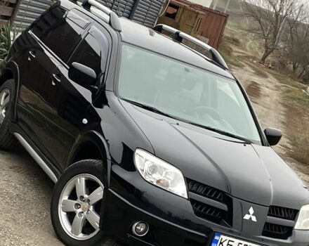 Черный Мицубиси Аутлендер, объемом двигателя 2.4 л и пробегом 178 тыс. км за 6900 $, фото 4 на Automoto.ua