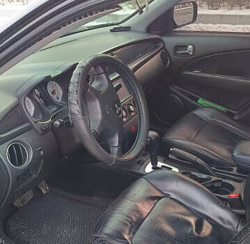 Мицубиси Аутлендер 2008 в Днепре (Днепропетровске) на Automoto.ua Черный Мицубиси Аутлендер, объемом двигателя 2.38 л и пробегом 320 тыс. км за 7500 $, фото 13 на Automoto.ua