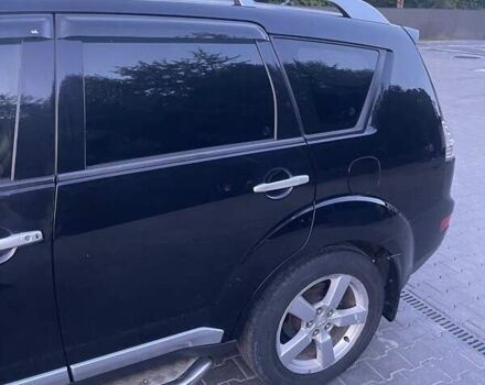 Черный Мицубиси Аутлендер, объемом двигателя 2.4 л и пробегом 290 тыс. км за 9500 $, фото 6 на Automoto.ua