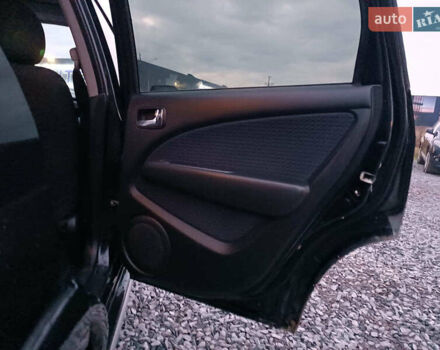 Чорний Міцубісі Аутлендер, об'ємом двигуна 2 л та пробігом 271 тис. км за 6940 $, фото 17 на Automoto.ua