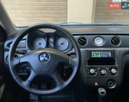 Черный Мицубиси Аутлендер, объемом двигателя 2 л и пробегом 270 тыс. км за 7199 $, фото 38 на Automoto.ua