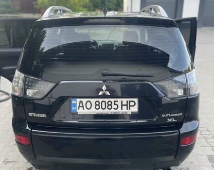 Черный Мицубиси Аутлендер, объемом двигателя 2.4 л и пробегом 290 тыс. км за 9500 $, фото 8 на Automoto.ua