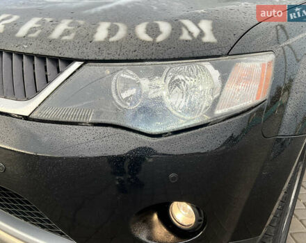 Черный Мицубиси Аутлендер, объемом двигателя 2.4 л и пробегом 230 тыс. км за 6650 $, фото 70 на Automoto.ua