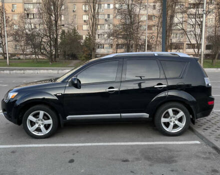 Черный Мицубиси Аутлендер, объемом двигателя 2.4 л и пробегом 237 тыс. км за 5000 $, фото 4 на Automoto.ua
