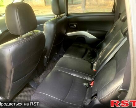 Черный Мицубиси Аутлендер, объемом двигателя 2.4 л и пробегом 230 тыс. км за 8500 $, фото 3 на Automoto.ua