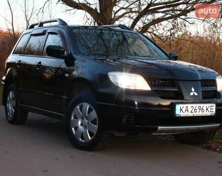 Черный Мицубиси Аутлендер, объемом двигателя 2 л и пробегом 189 тыс. км за 7200 $, фото 20 на Automoto.ua