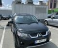 Чорний Міцубісі Аутлендер, об'ємом двигуна 2.4 л та пробігом 137 тис. км за 8700 $, фото 4 на Automoto.ua