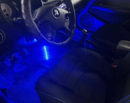 Черный Мицубиси Аутлендер, объемом двигателя 2 л и пробегом 130 тыс. км за 7500 $, фото 5 на Automoto.ua