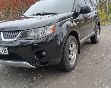 Чорний Міцубісі Аутлендер, об'ємом двигуна 2.36 л та пробігом 265 тис. км за 8800 $, фото 20 на Automoto.ua
