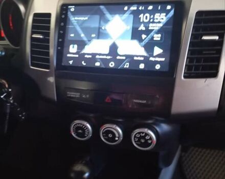 Черный Мицубиси Аутлендер, объемом двигателя 2.35 л и пробегом 245 тыс. км за 8000 $, фото 13 на Automoto.ua