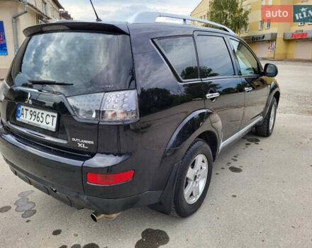 Чорний Міцубісі Аутлендер, об'ємом двигуна 2.4 л та пробігом 205 тис. км за 8400 $, фото 13 на Automoto.ua