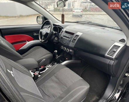 Міцубісі Аутлендер 2008 у Кременчуге на Automoto.ua Чорний Міцубісі Аутлендер, об'ємом двигуна 2.4 л та пробігом 230 тис. км за 6650 $, фото 49 на Automoto.ua