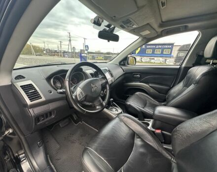 Чорний Міцубісі Аутлендер, об'ємом двигуна 2.4 л та пробігом 218 тис. км за 10000 $, фото 3 на Automoto.ua