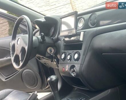 Черный Мицубиси Аутлендер, объемом двигателя 2.4 л и пробегом 178 тыс. км за 6900 $, фото 19 на Automoto.ua