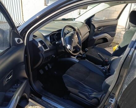 Черный Мицубиси Аутлендер, объемом двигателя 2.2 л и пробегом 200 тыс. км за 9500 $, фото 7 на Automoto.ua